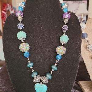 Individually linked turquoise heart neckl